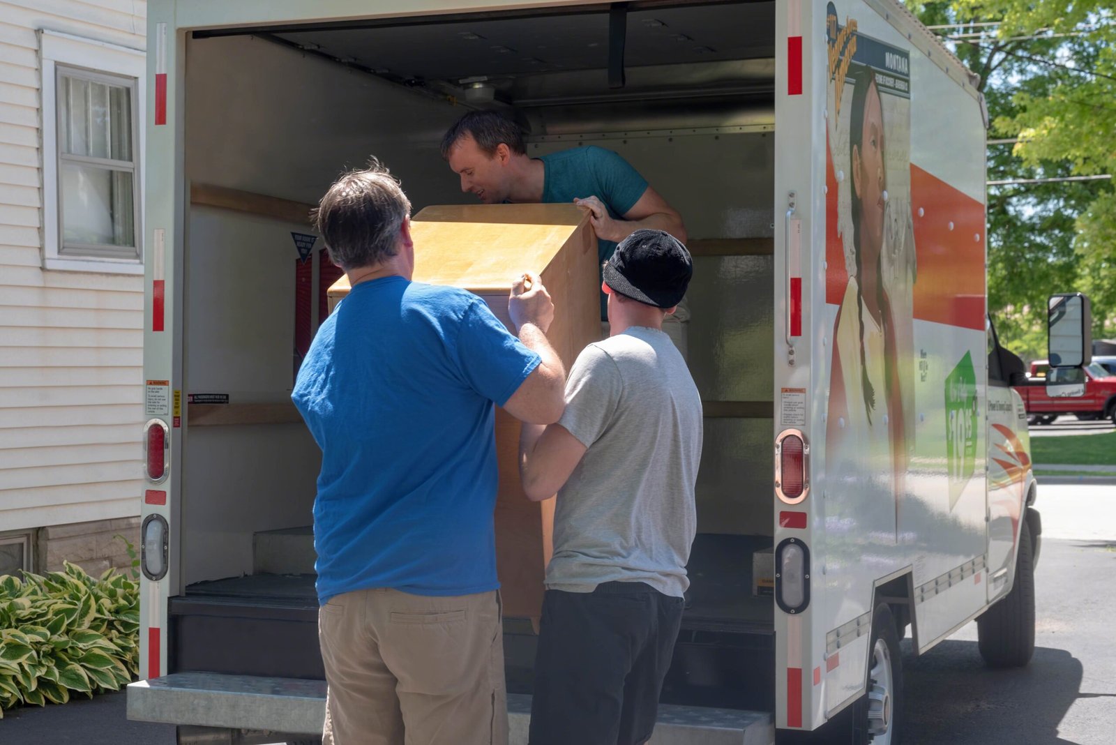 Loading furniture onto the truck on moving day